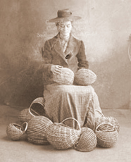 Woman with split oak baskets
